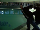 F8lError shoving Sintax into the hotel pool.