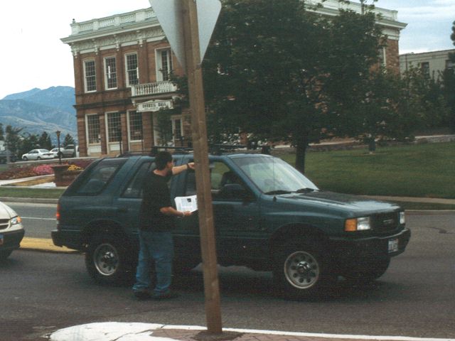 Kweejee handing out fliers.