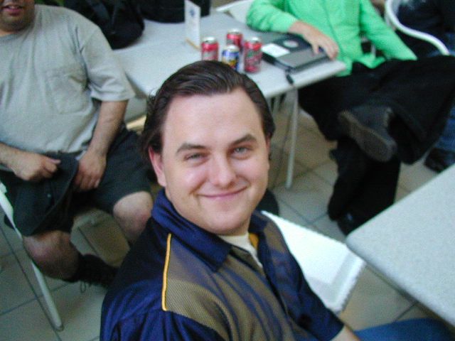A slicked back his hair.  It was frightening, I thought he looked like Vinny from Doogie Howser.