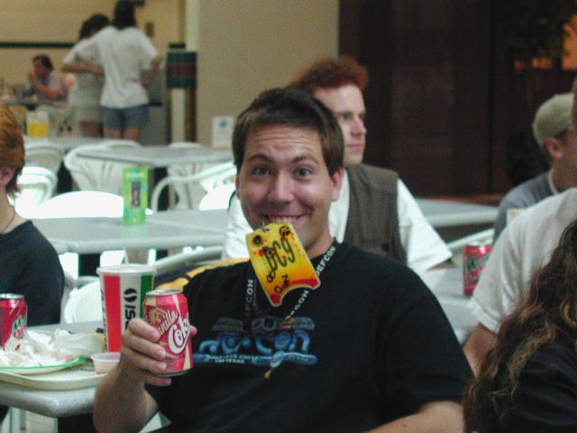 Kweejee eating his Defcon 9 badge.