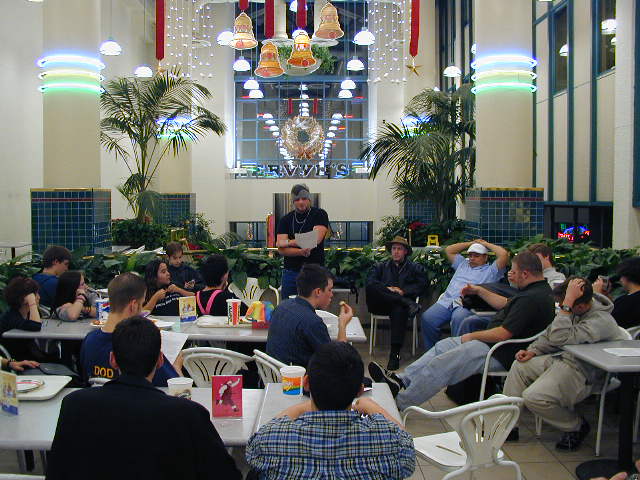 Despite these distractions, Devestate continues his talk.