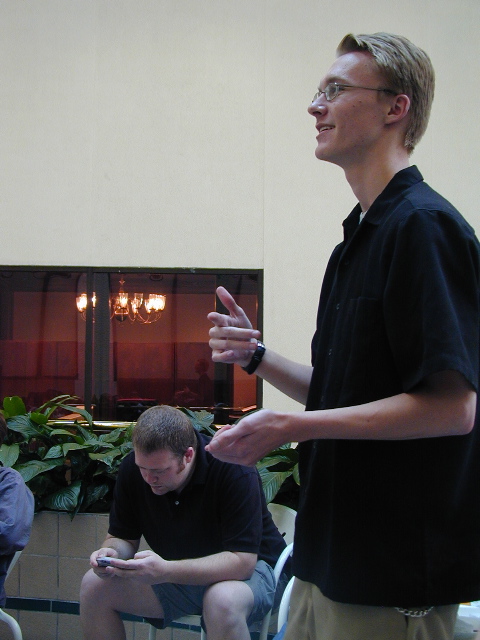 Manic Velocity begins his talk on iTunes 4.