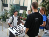 Grifter talking with a mormon group.